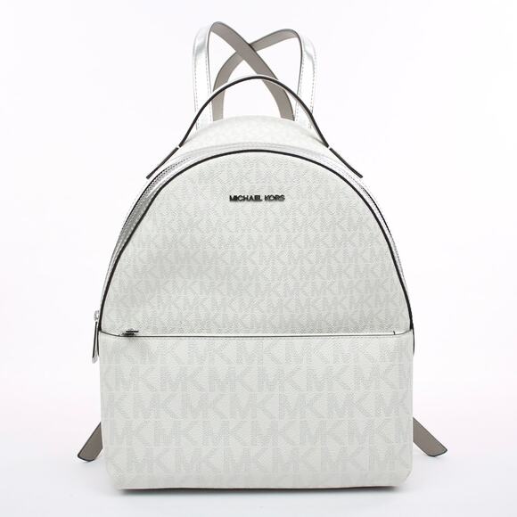 Michael Kors Handbags - Michael Kors Silver Logo Backpack